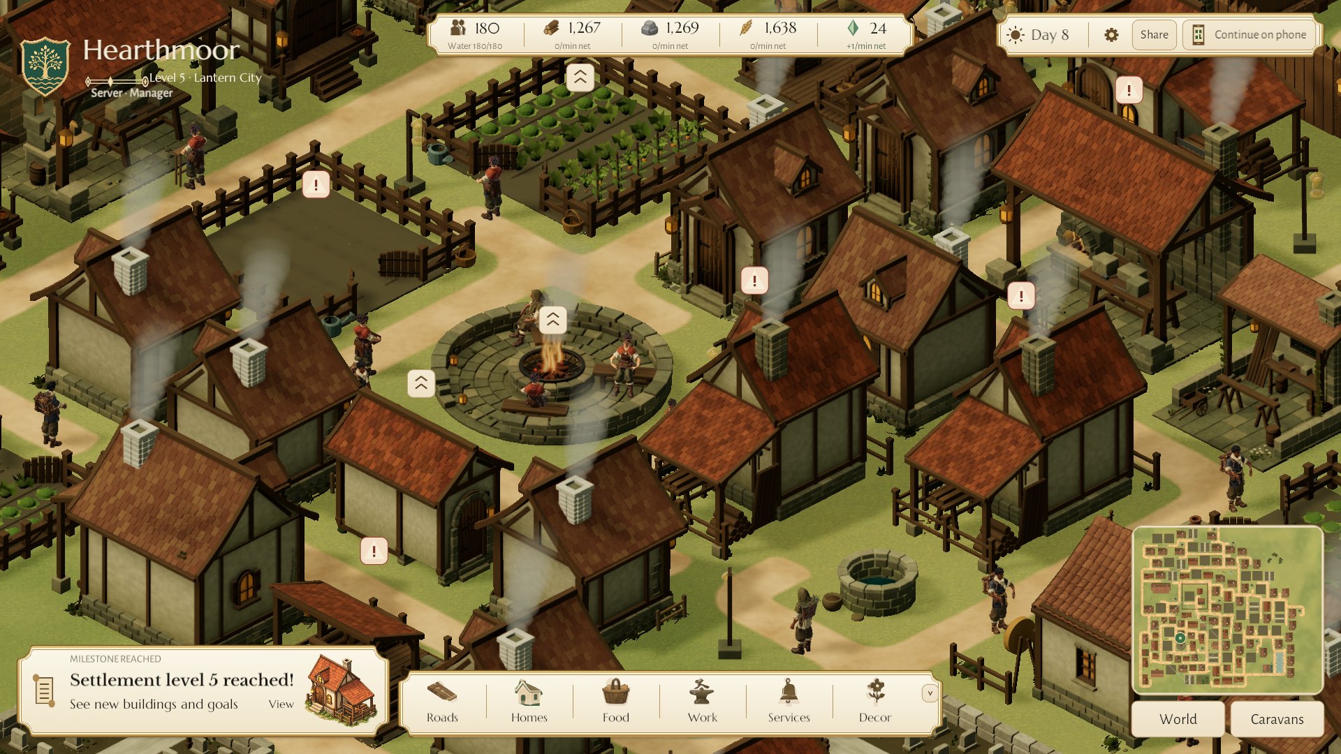 Villagers sitting and standing around the fire pit on the village green, with gardens and cottages around it.