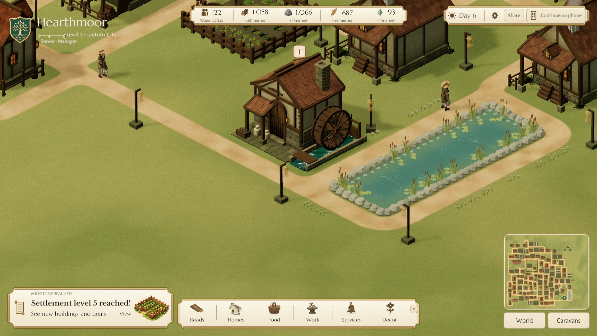 A watermill with its wheel turning beside a lily pond, a lantern-lit path and a villager walking by.